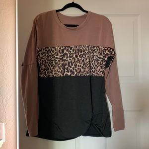 Cute poly cotton blend shirt! Animal stripe across breast area! Long sleeves